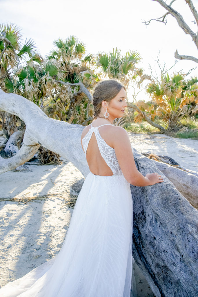 back of beaded lace and tulle aline wedding dress with open back at driftwood beach